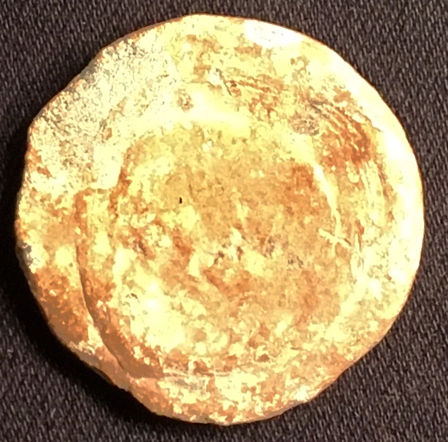 Any-Ideas-On-This-Shell-Shaped-Lump-Of-Lead?